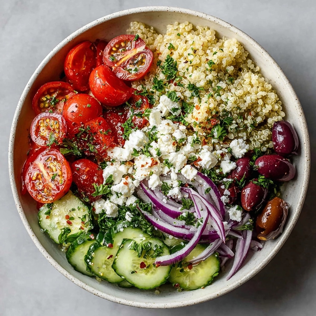Enjoy a flavorful bowl of Greek Quinoa Salad: a healthy, delicious lunch, or light dinner.