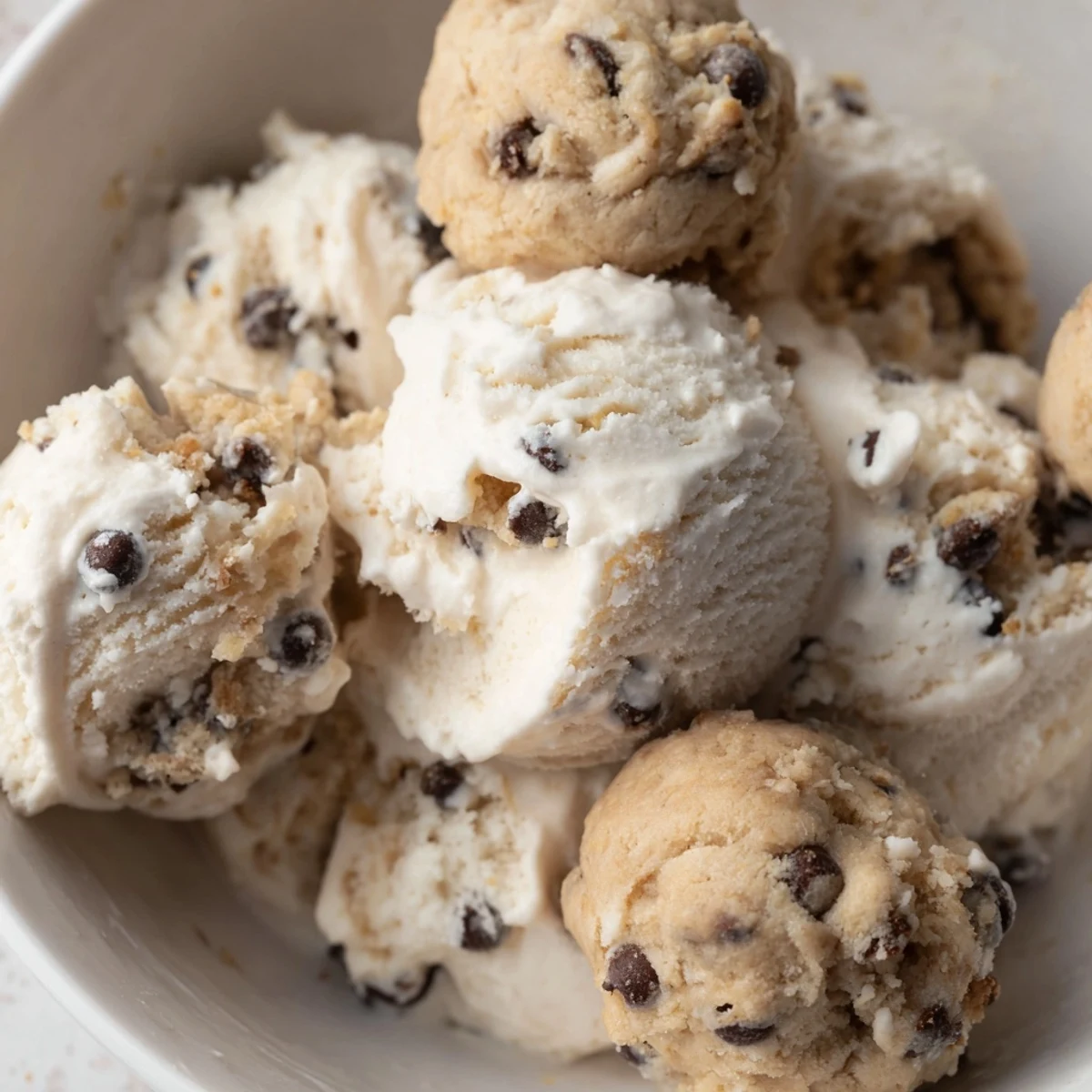 Delicious Cottage Cheese Ice Cream topped with chocolate chip cookie dough bites.  