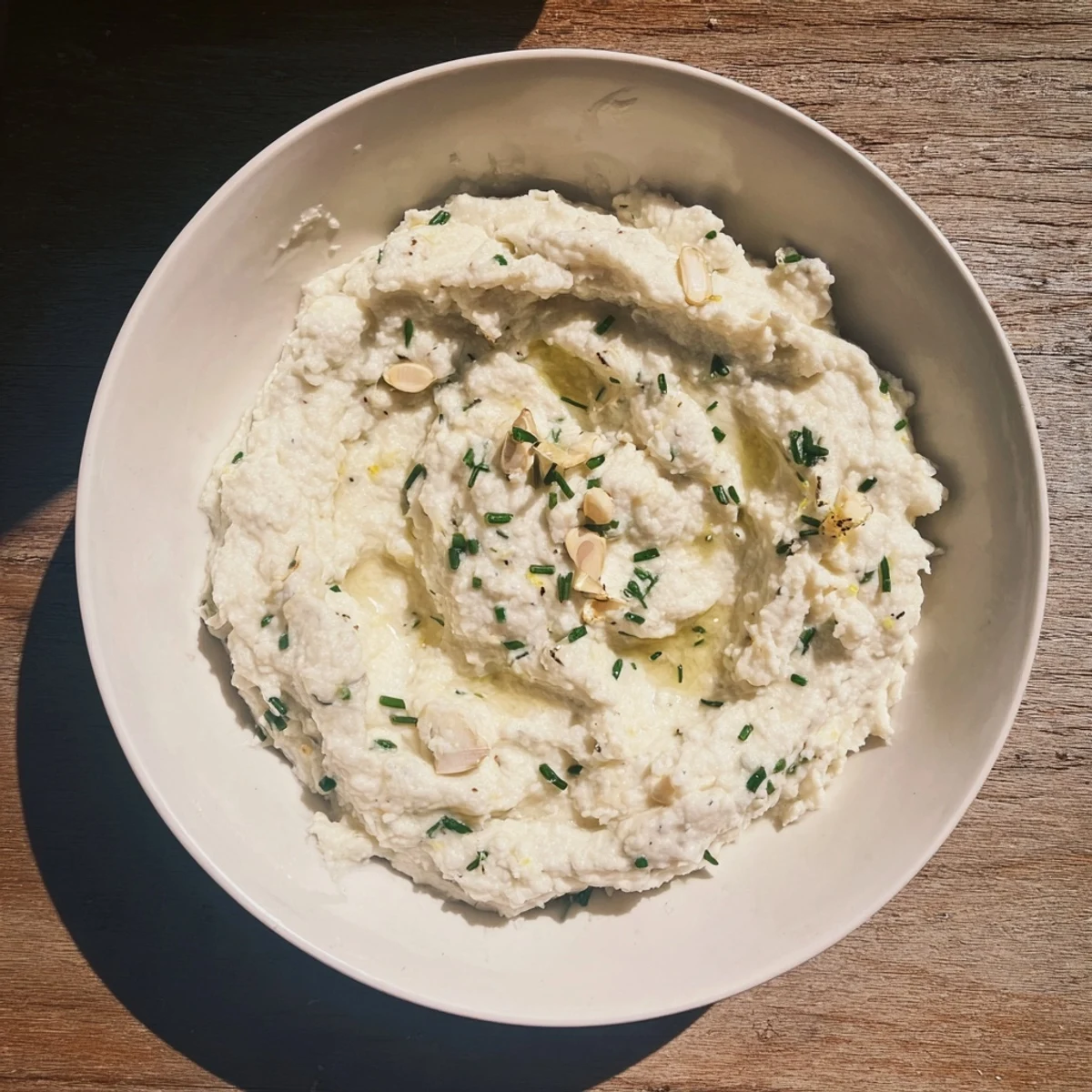 Picture a smooth, comforting bowl of cauliflower mash – a delicious, healthy side dish.