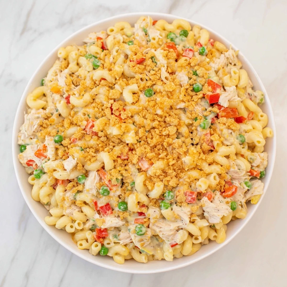 Imagine a close-up of cheesy, golden-brown Chicken Macaroni Southern Style with vibrant bell peppers and tender chicken.