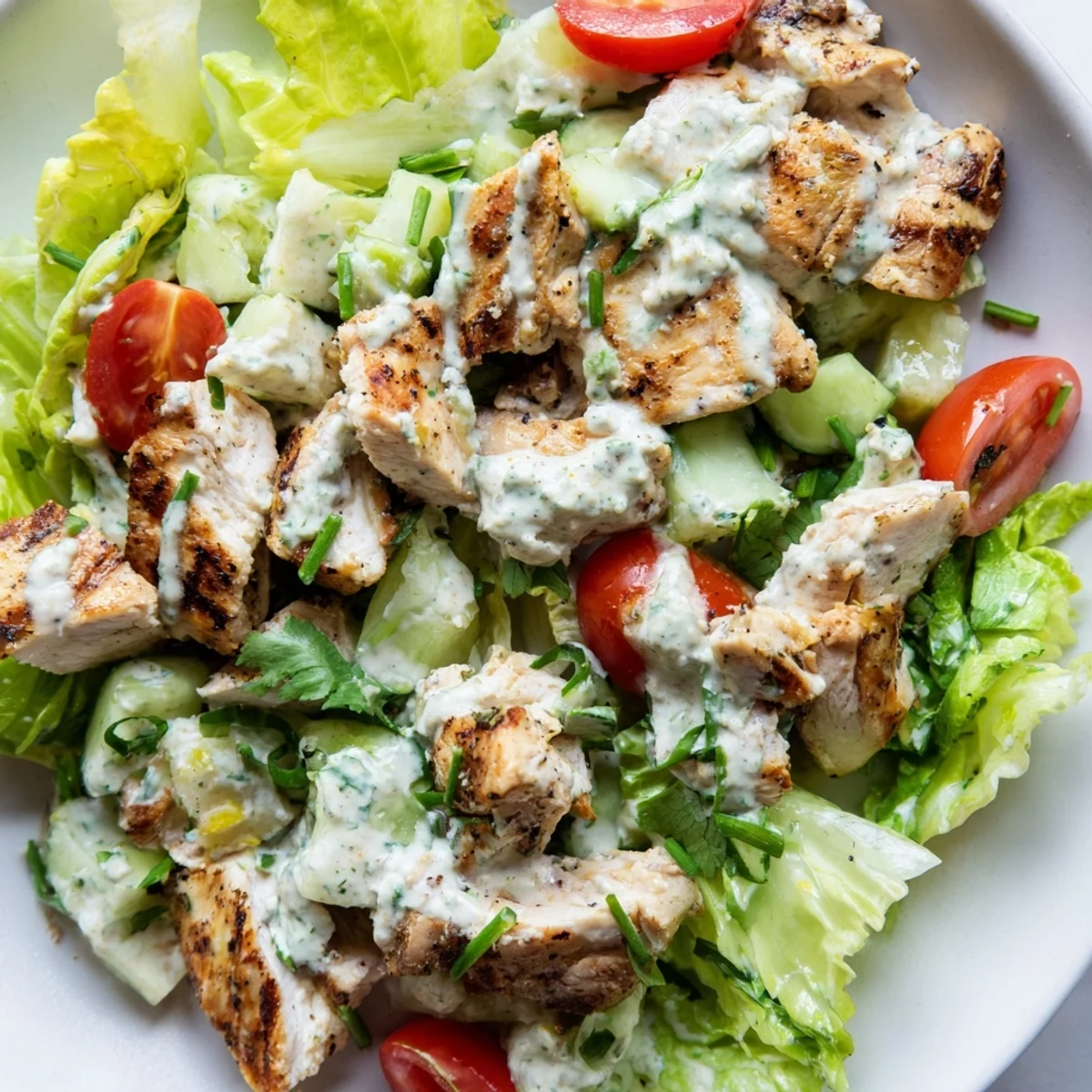 Freshly grilled chicken is chopped and tossed in a creamy, zesty jalapeño ranch dressing, served over crisp romaine lettuce.  