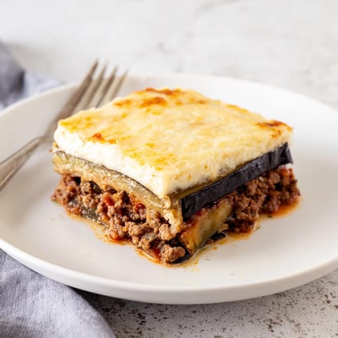 Layers of tender eggplant and spiced beef create hearty Moussaka for a comforting meal.  