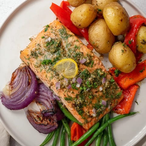 Vibrant image of Lemon Herb Salmon & Potato Sheet Pan, a complete, flavorful and healthy meal.