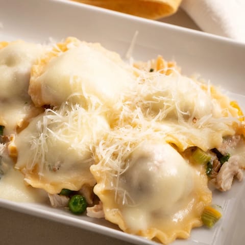 Hearty Chicken Pot Pie Ravioli Bake, promising a satisfying family dinner with tender ravioli.