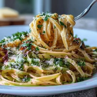 Vibrant lemon butter pasta with peas and Parmesan, a fresh and creamy vegetarian dinner perfect for spring.